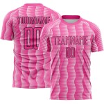 Benutzerdefiniertes rosa schwarz-weißes geometrisches Sublimations-Fußballuniformtrikot Benutzerdefiniertes rosa schwarz-weißes geometrisches Sublimations-Fußballuniformtrikot